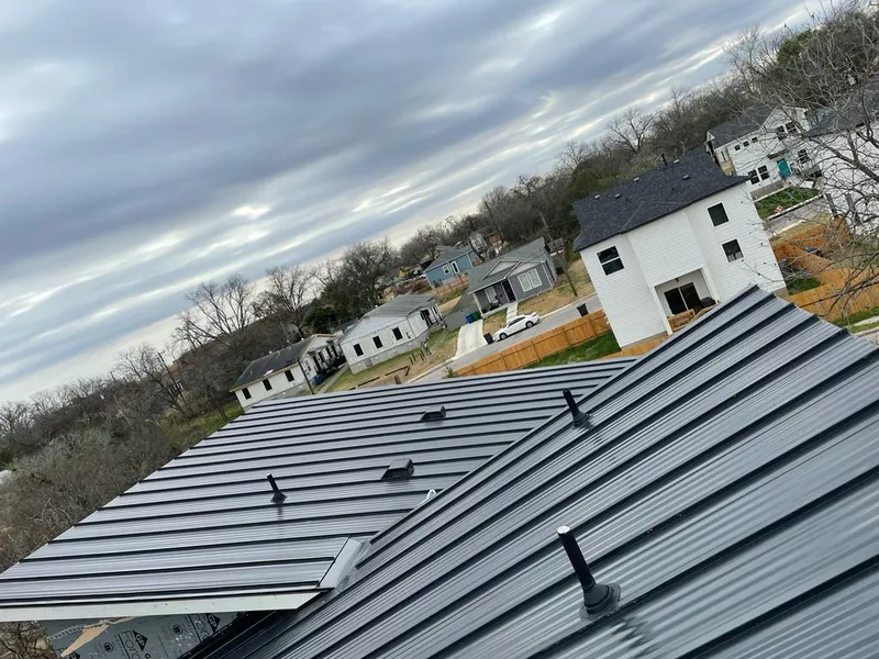 Standing seam metal roof panels with vents for Skylight Repair in Shelburne